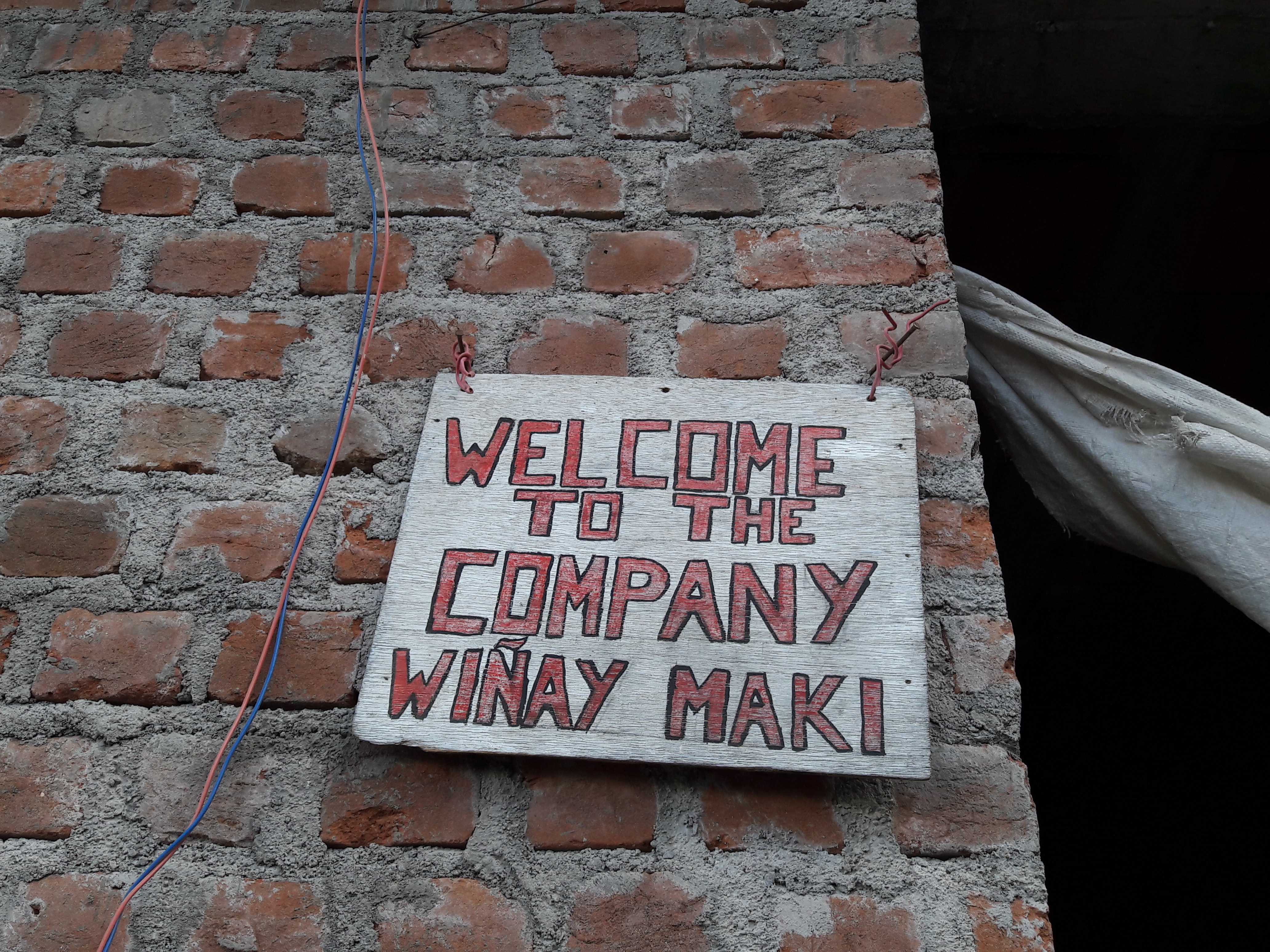 sign saying Welcome to the company Winay Maki